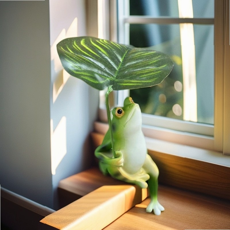تمثال حديقة على شكل ضفدع يحمل  - مراجعة Aquarium Decor وسعره